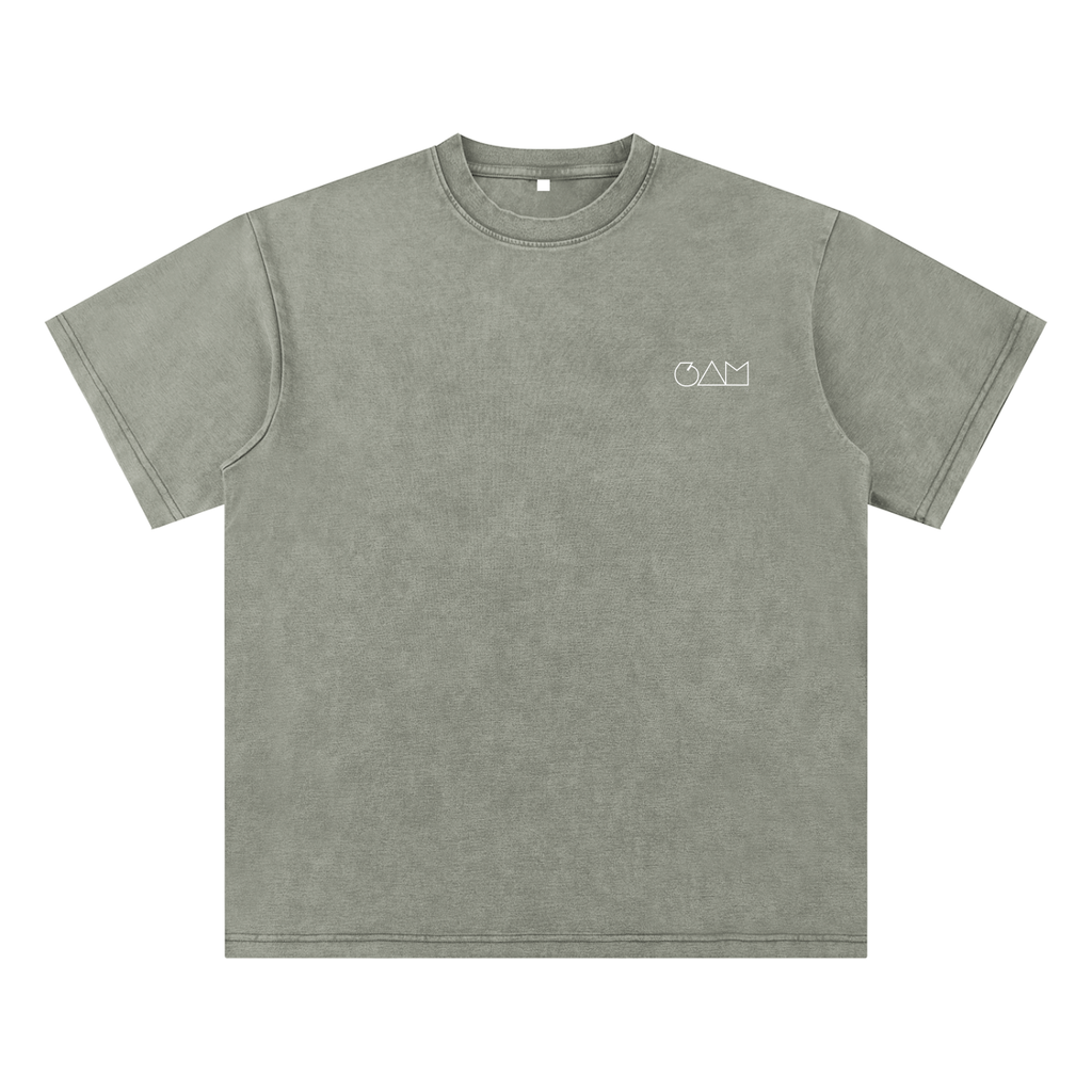  T-shirt gris-beige 6AM coupe boxy oversize, coton épais lavé, texture brute, finition vintage washed.